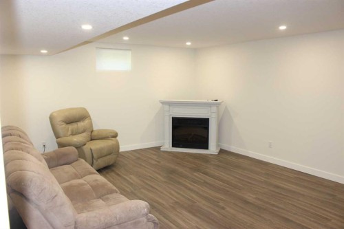 518 Maple Crescent, Picture Butte, AB - Indoor With Fireplace