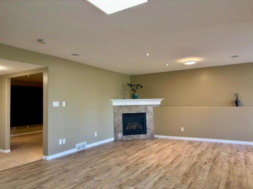 314 Coulee Springs Terrace South, Lethbridge, AB - Indoor With Fireplace