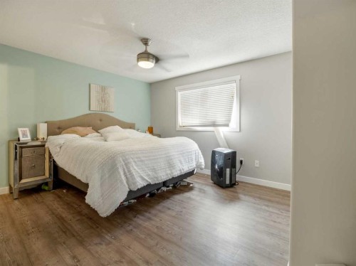 2244 18 Avenue, Coaldale, AB - Indoor Photo Showing Bedroom