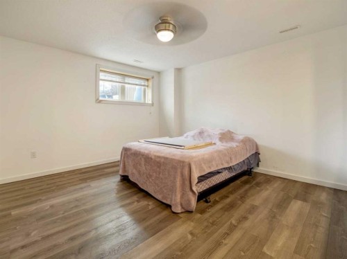 2244 18 Avenue, Coaldale, AB - Indoor Photo Showing Bedroom