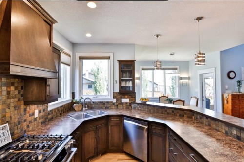 19 Canyoncrest Court West, Lethbridge, AB - Indoor Photo Showing Kitchen With Double Sink
