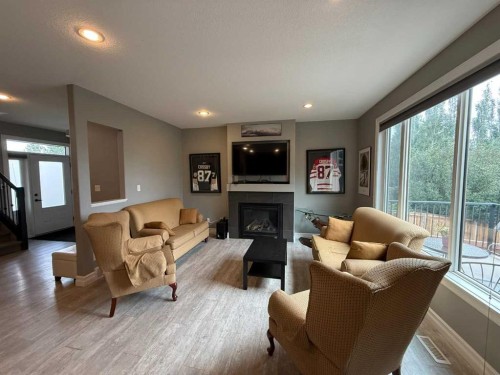 917 Canyonview Place West, Lethbridge, AB - Indoor Photo Showing Other Room With Fireplace