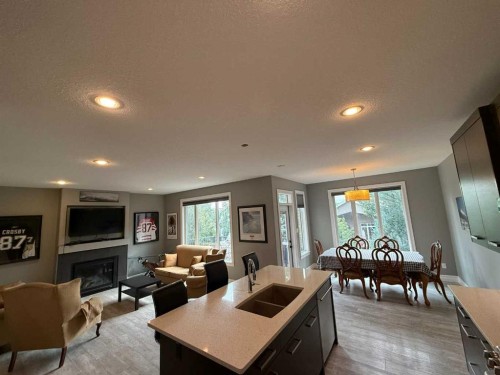 917 Canyonview Place West, Lethbridge, AB - Indoor With Fireplace