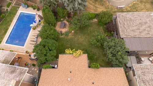 105 Kings Bay South, Lethbridge, AB - Outdoor With In Ground Pool