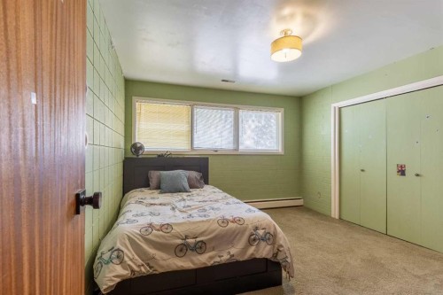 54032 Rr 20-2, Raymond, AB - Indoor Photo Showing Bedroom