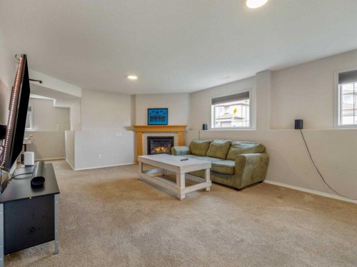 95 Heritage Point West, Lethbridge, AB - Indoor With Fireplace