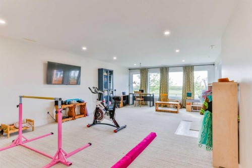 1222 Pacific Circle West, Lethbridge, AB - Indoor Photo Showing Gym Room