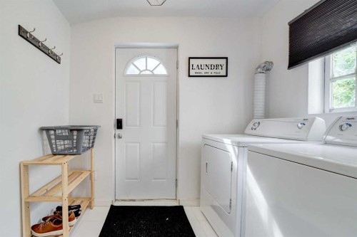 201 5 Street, Cowley, AB - Indoor Photo Showing Laundry Room