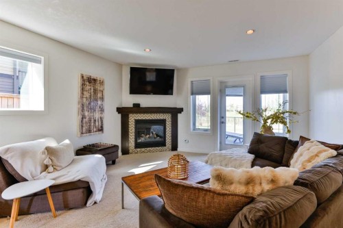 154 Lasalle Terrace West, Lethbridge, AB - Indoor Photo Showing Living Room With Fireplace