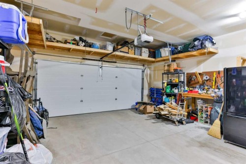 154 Lasalle Terrace West, Lethbridge, AB - Indoor Photo Showing Garage