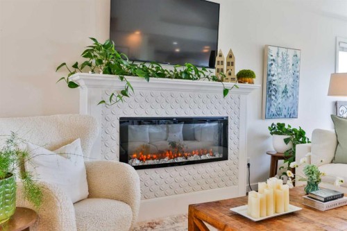 154 Lasalle Terrace West, Lethbridge, AB - Indoor Photo Showing Living Room With Fireplace
