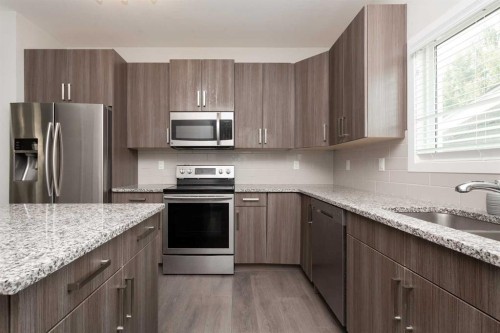 417 Moonlight Way West, Lethbridge, AB - Indoor Photo Showing Kitchen With Stainless Steel Kitchen With Upgraded Kitchen