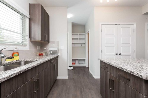 417 Moonlight Way West, Lethbridge, AB - Indoor Photo Showing Kitchen With Double Sink