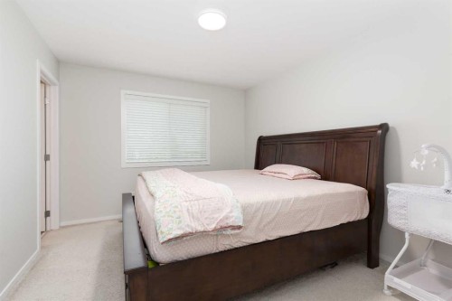 417 Moonlight Way West, Lethbridge, AB - Indoor Photo Showing Bedroom