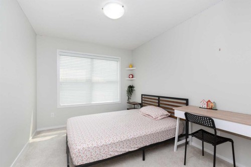 417 Moonlight Way West, Lethbridge, AB - Indoor Photo Showing Bedroom