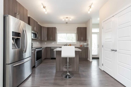 417 Moonlight Way West, Lethbridge, AB - Indoor Photo Showing Kitchen With Stainless Steel Kitchen With Upgraded Kitchen