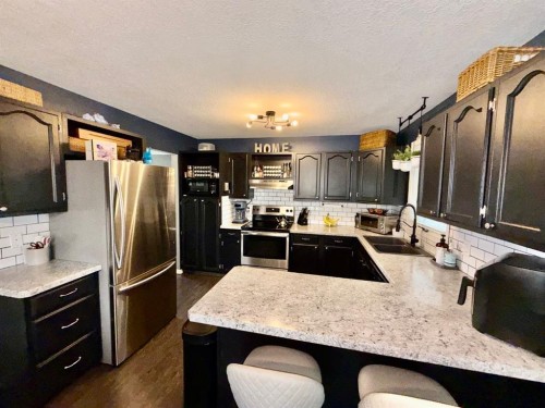 1914 17 Street North, Lethbridge, AB - Indoor Photo Showing Kitchen With Double Sink With Upgraded Kitchen