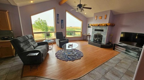 507 1 Avenue, Warner, AB - Indoor Photo Showing Living Room With Fireplace
