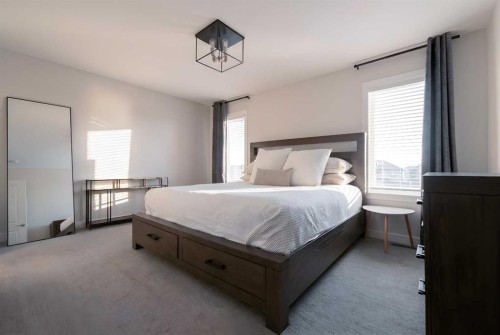 781 Atlantic Cove West, Lethbridge, AB - Indoor Photo Showing Bedroom