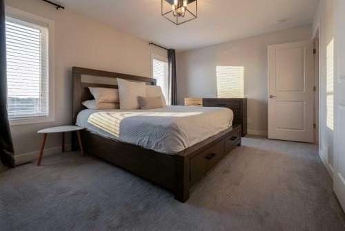 781 Atlantic Cove West, Lethbridge, AB - Indoor Photo Showing Bedroom