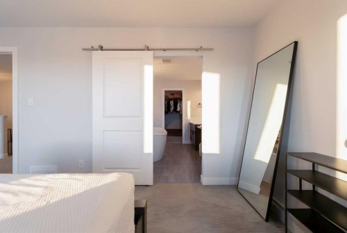 781 Atlantic Cove West, Lethbridge, AB - Indoor Photo Showing Bedroom
