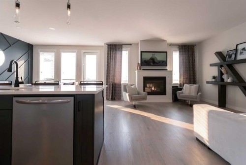 781 Atlantic Cove West, Lethbridge, AB - Indoor With Fireplace