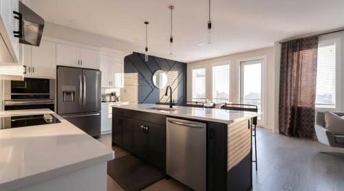 781 Atlantic Cove West, Lethbridge, AB - Indoor Photo Showing Kitchen With Stainless Steel Kitchen With Upgraded Kitchen