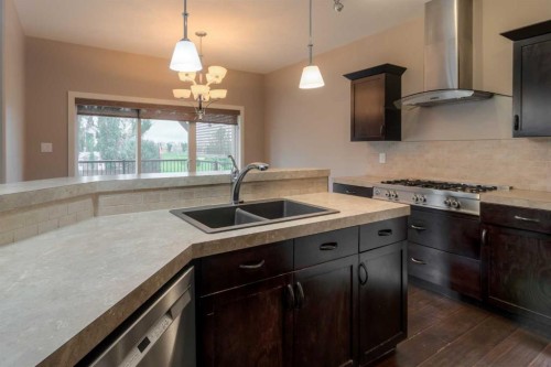 810 Keystone Meadows West, Lethbridge, AB - Indoor Photo Showing Kitchen With Double Sink