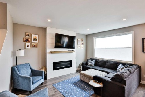 183 Crocus Terrace West, Lethbridge, AB - Indoor Photo Showing Living Room With Fireplace