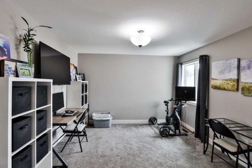 183 Crocus Terrace West, Lethbridge, AB - Indoor Photo Showing Gym Room