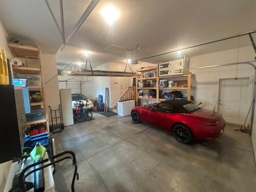 320 Stonecrest Place West, Lethbridge, AB - Indoor Photo Showing Garage