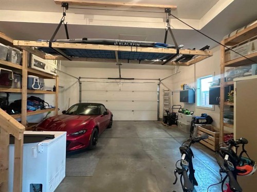 320 Stonecrest Place West, Lethbridge, AB - Indoor Photo Showing Garage