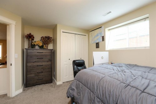 14 Centennial Place, Magrath, AB - Indoor Photo Showing Bedroom