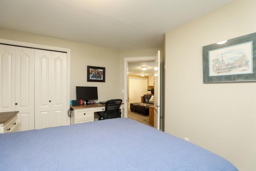 14 Centennial Place, Magrath, AB - Indoor Photo Showing Bedroom