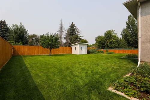 14 Centennial Place, Magrath, AB - Outdoor With Backyard
