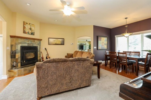 14 Centennial Place, Magrath, AB - Indoor Photo Showing Living Room With Fireplace