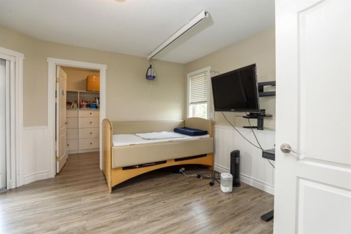 14 Centennial Place, Magrath, AB - Indoor Photo Showing Bedroom