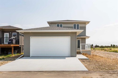320 Aquitania Boulevard West, Lethbridge, AB - Outdoor With Exterior