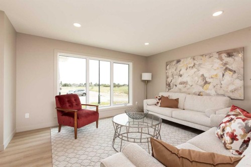 320 Aquitania Boulevard West, Lethbridge, AB - Indoor Photo Showing Living Room