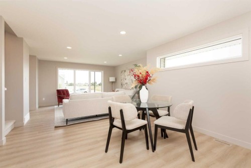 320 Aquitania Boulevard West, Lethbridge, AB - Indoor Photo Showing Dining Room