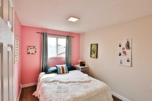 100 Eton Road West, Lethbridge, AB - Indoor Photo Showing Bedroom