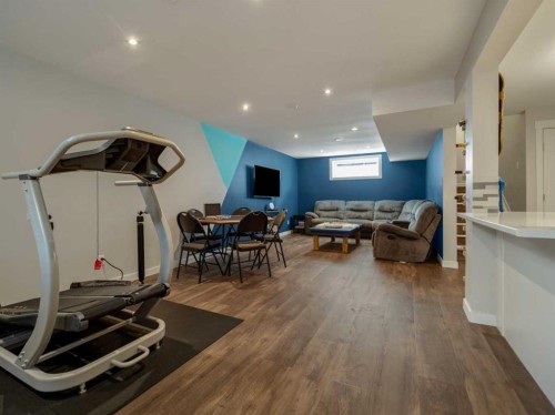 187 Westgate Drive, Coaldale, AB - Indoor Photo Showing Gym Room