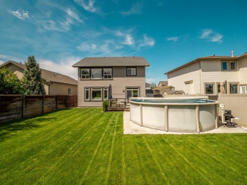 187 Westgate Drive, Coaldale, AB - Outdoor With Above Ground Pool With Backyard With Exterior