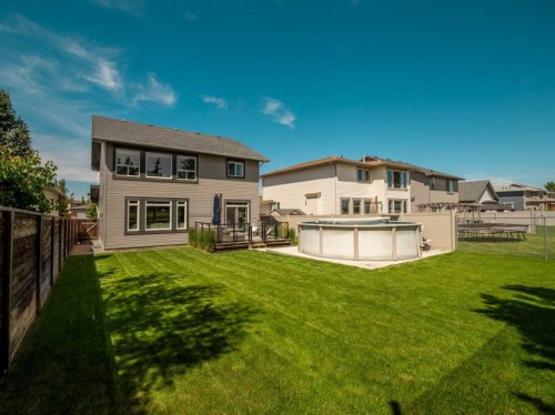 187 Westgate Drive, Coaldale, AB - Outdoor With Above Ground Pool With Backyard