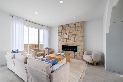 347 Blackwolf Boulevard North, Lethbridge, AB - Indoor Photo Showing Living Room With Fireplace