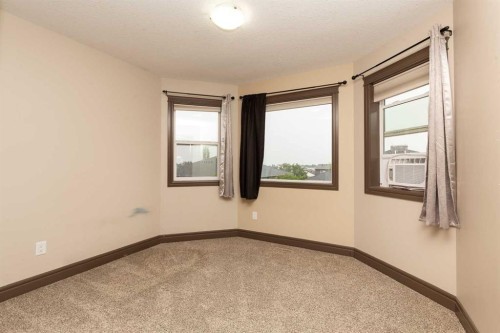 873 Mt Sundance Manor West, Lethbridge, AB - Indoor Photo Showing Other Room