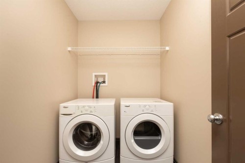 873 Mt Sundance Manor West, Lethbridge, AB - Indoor Photo Showing Laundry Room