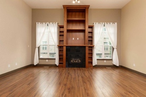 873 Mt Sundance Manor West, Lethbridge, AB - Indoor With Fireplace