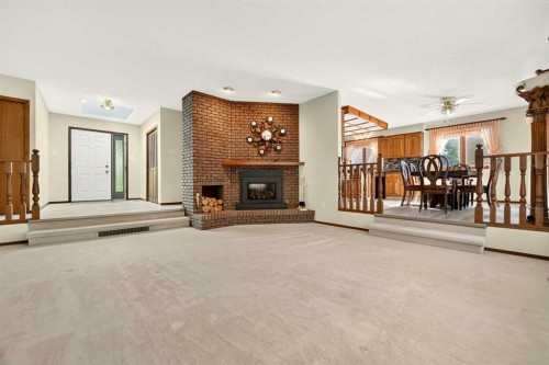 3606 Spruce Drive South, Lethbridge, AB - Indoor With Fireplace