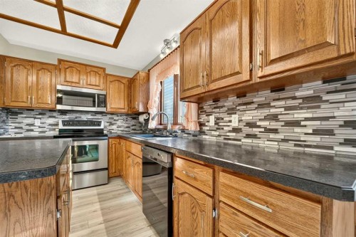 3606 Spruce Drive South, Lethbridge, AB - Indoor Photo Showing Kitchen With Stainless Steel Kitchen
